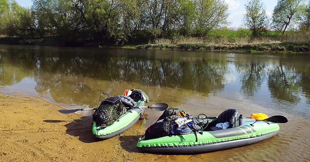 Inflatable Kayak on a river bank