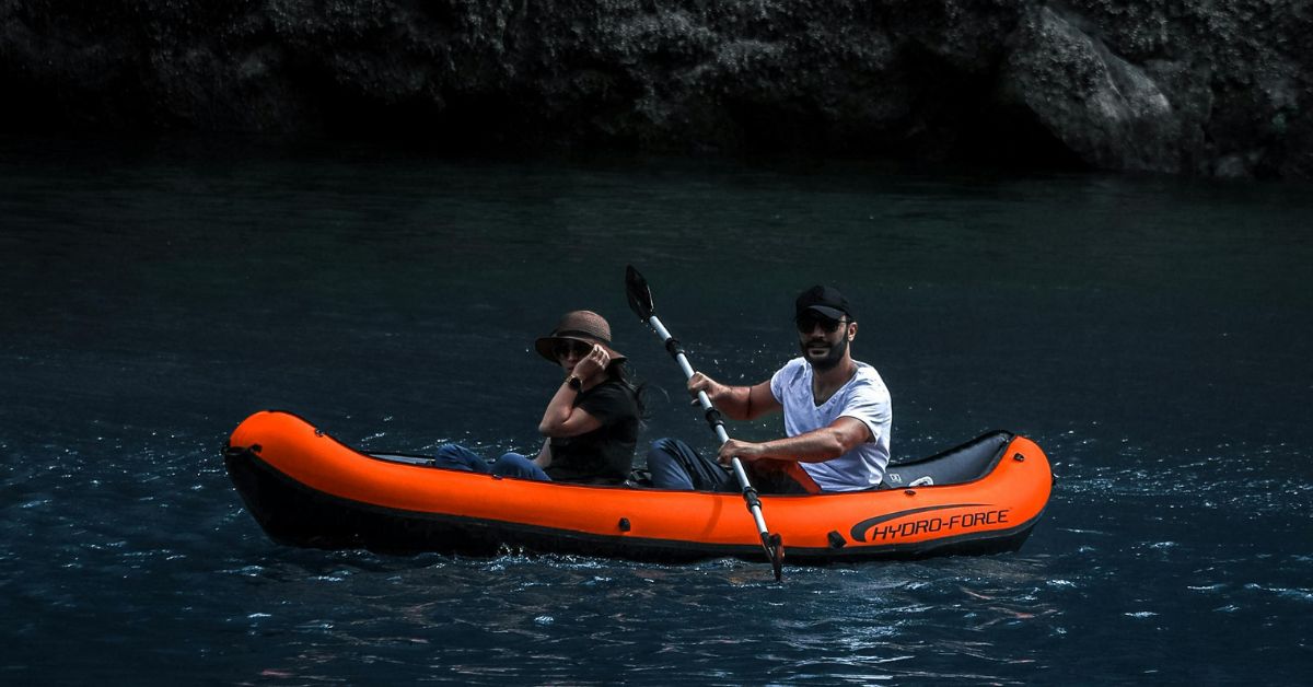 Two people in a kayak on the river